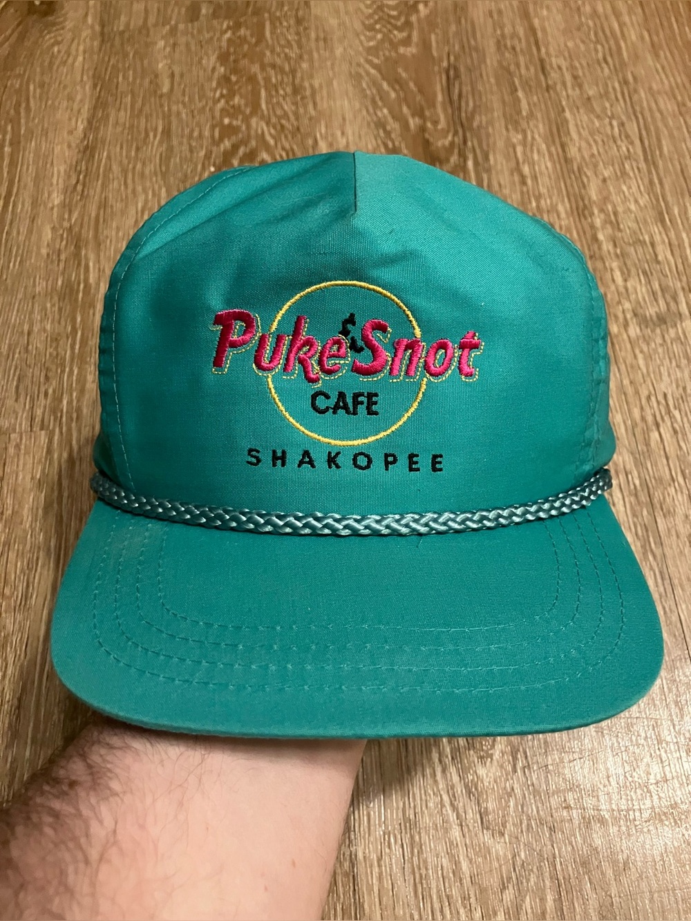 PukeSnot Cafe Shakopee Minnesota hat with embroidered logo. One size fits all. #
